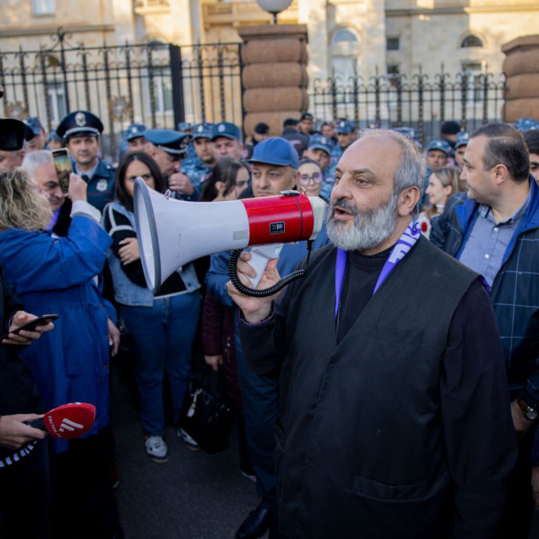 Archbishop Bagrat Galstanyan addresses the crowd with a megaphone during a protest in Yerevan, Armenia, on Oct. 25, 2024. Archbishop Bagrat Galstanyan addresses the crowd with a megaphone during a protest in Yerevan, Armenia, on Oct. 25, 2024.