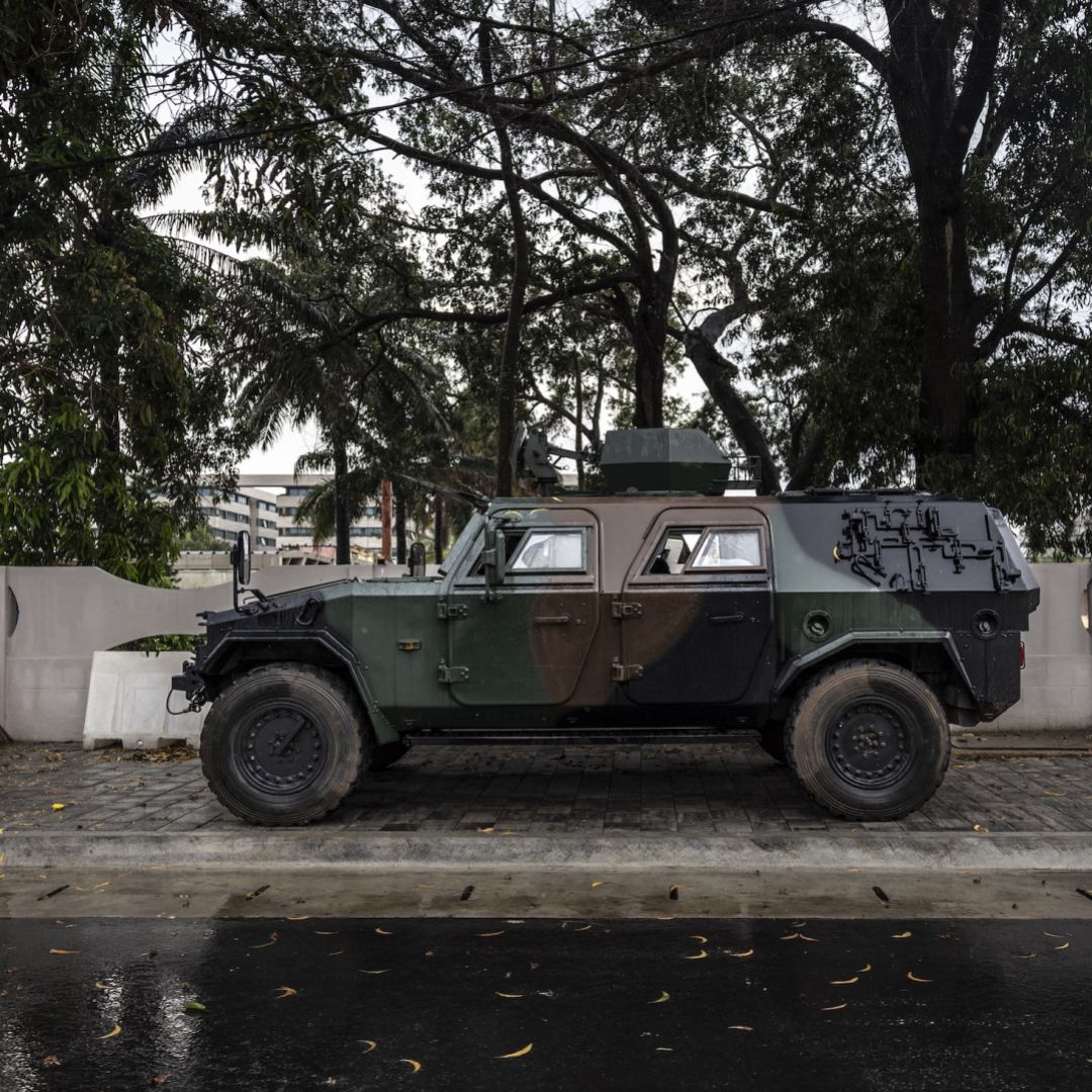 A photo taken on Dec. 8, 2025, shows an armored vehicle at the entrance of a blocked road in Cotonou, Benin, near the headquarters of the state broadcaster Benin TV. A photo taken on Dec. 8, 2025, shows an armored vehicle at the entrance of a blocked road in Cotonou, Benin, near the headquarters of the state broadcaster Benin TV.