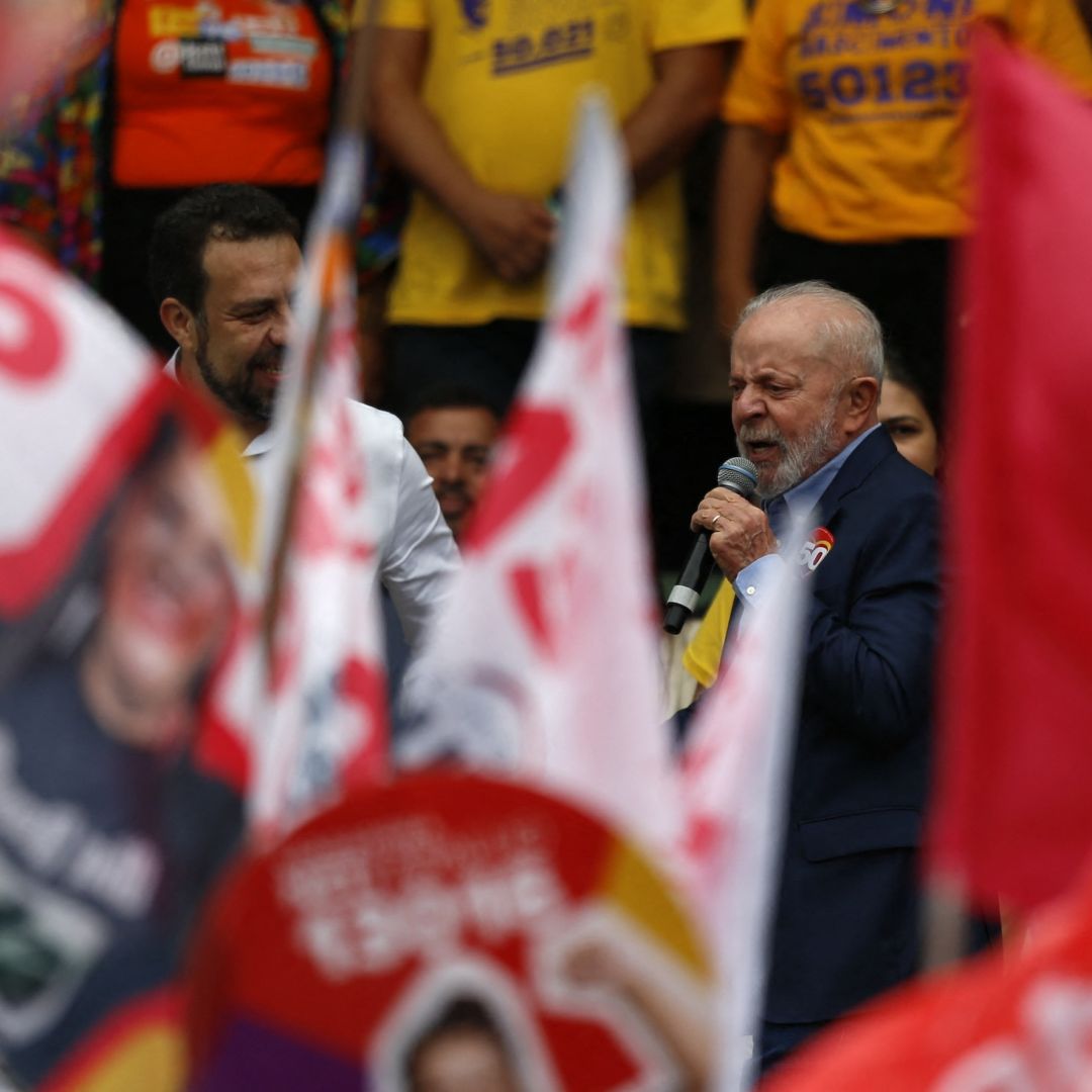 Brazilian President Luiz Inacio Lula da Silva speaks during a rally supporting Sao Paulo mayoral candidate Guilherme Boulos (L) on Aug. 24 in Sao Paulo, Brazil.