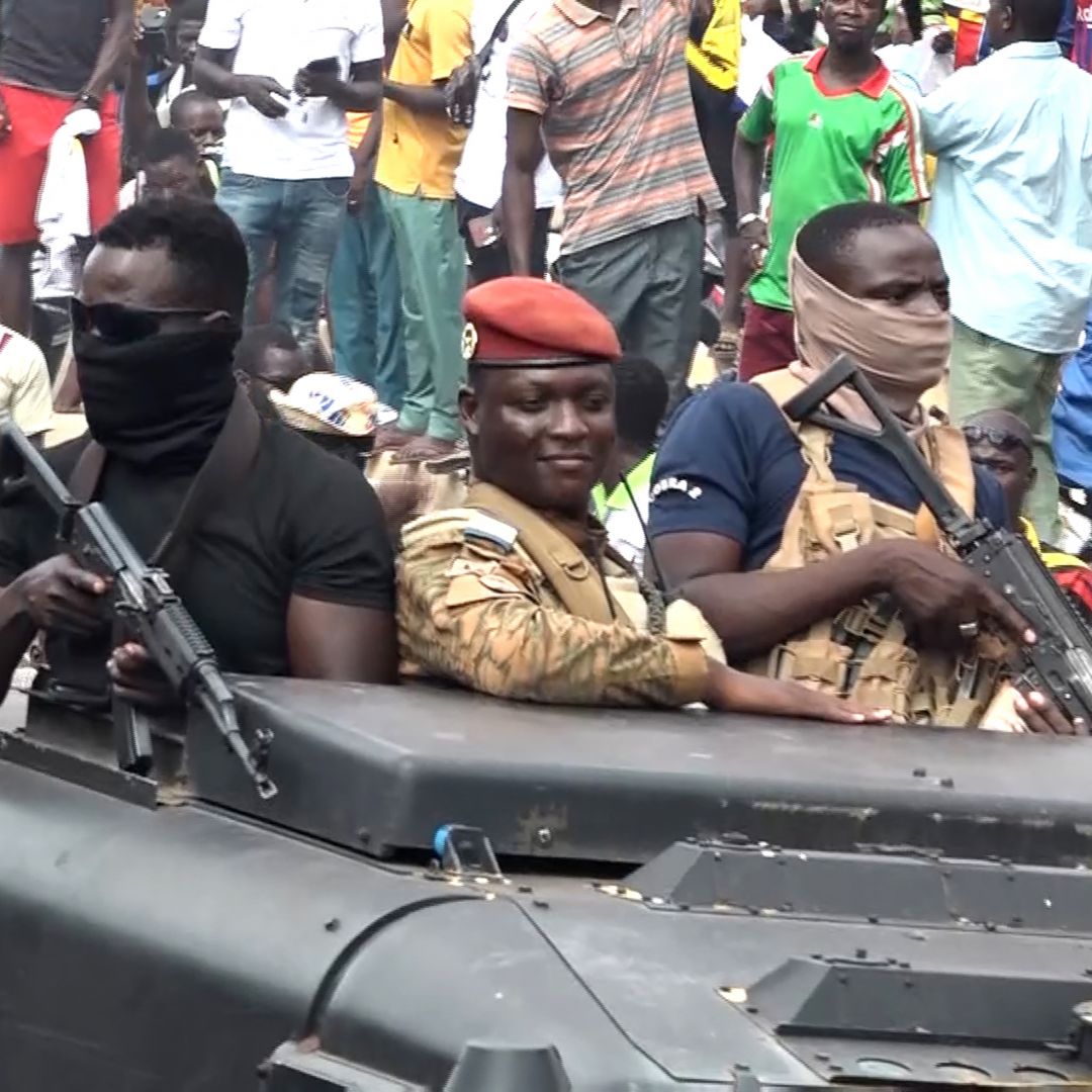 The new self-proclaimed leader of the military junta ruling Burkina Faso, Captain Ibrahim Traore (C), on Oct. 2, 2022, in the Burkinabe capital of Ouagadougou. Burkina Faso's new military junta is unlikely to curb rising insecurity, while fraying ties with France could worsen the regional threat of jihadism. The new self-proclaimed leader of the military junta ruling Burkina Faso, Captain Ibrahim Traore (C), on Oct. 2, 2022, in the Burkinabe capital of Ouagadougou.