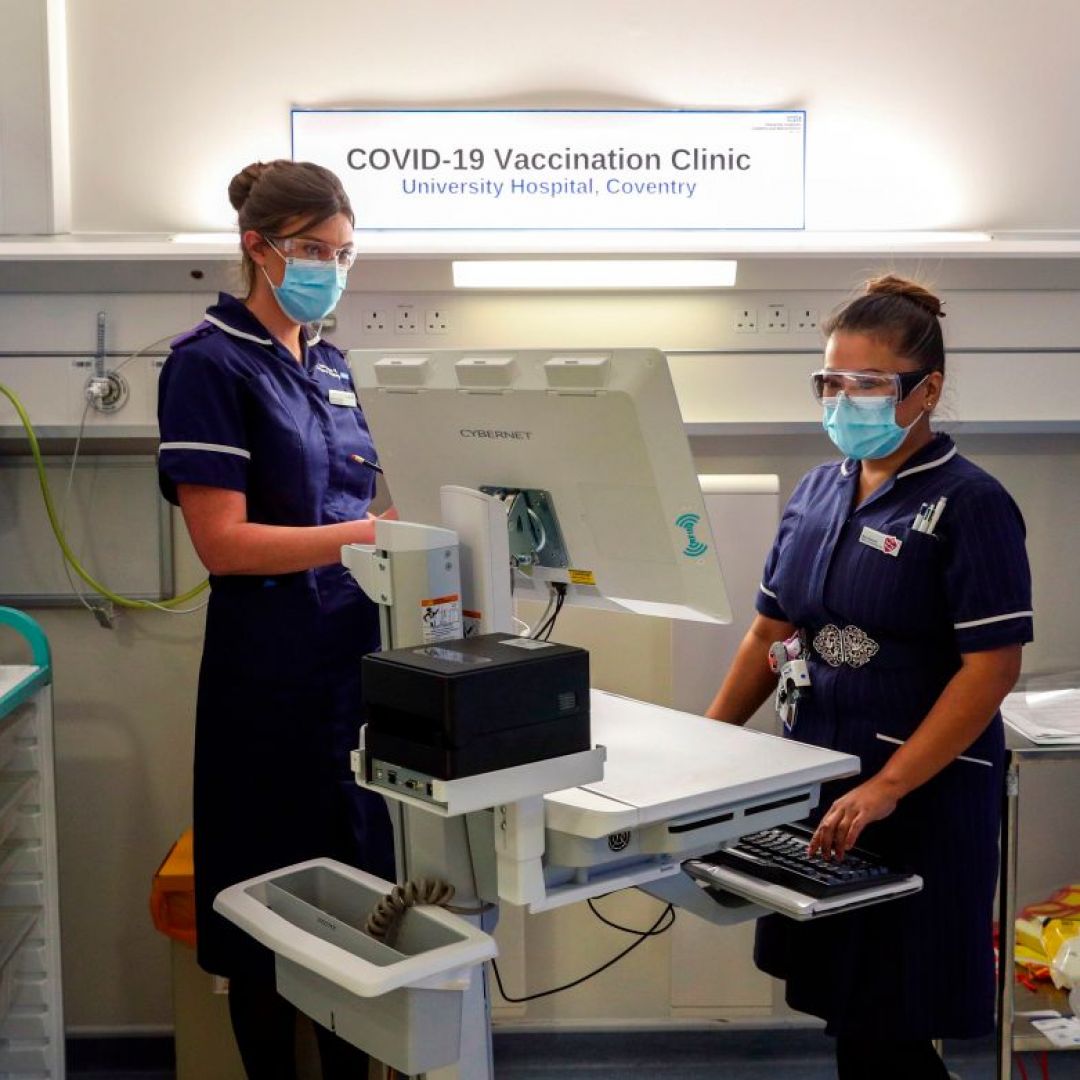 Nurses train in the COVID-19 Vaccination Clinic at the University Hospital in Coventry, England, on Dec. 4, 2020, prior to the beginning of the actual vaccination campaign.