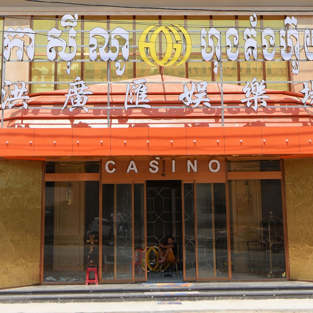 A man sits inside a casino in Sihanoukville, Cambodia, on Feb. 18, 2020.