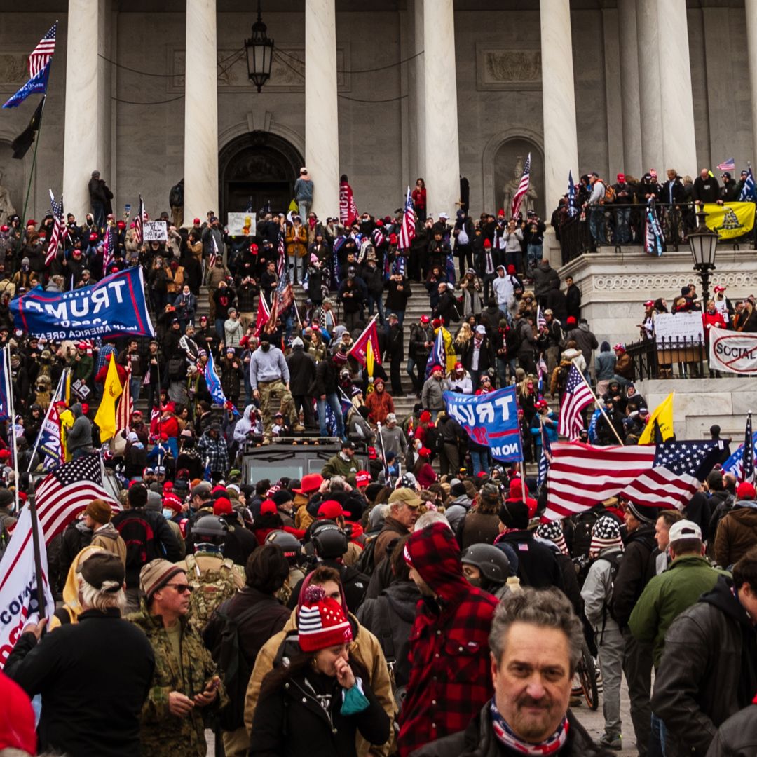 A large group of pro-Trump protesters stands on the steps of the U.S. Capitol after storming the building’s grounds on Jan. 6, 2021, in Washington D.C. 