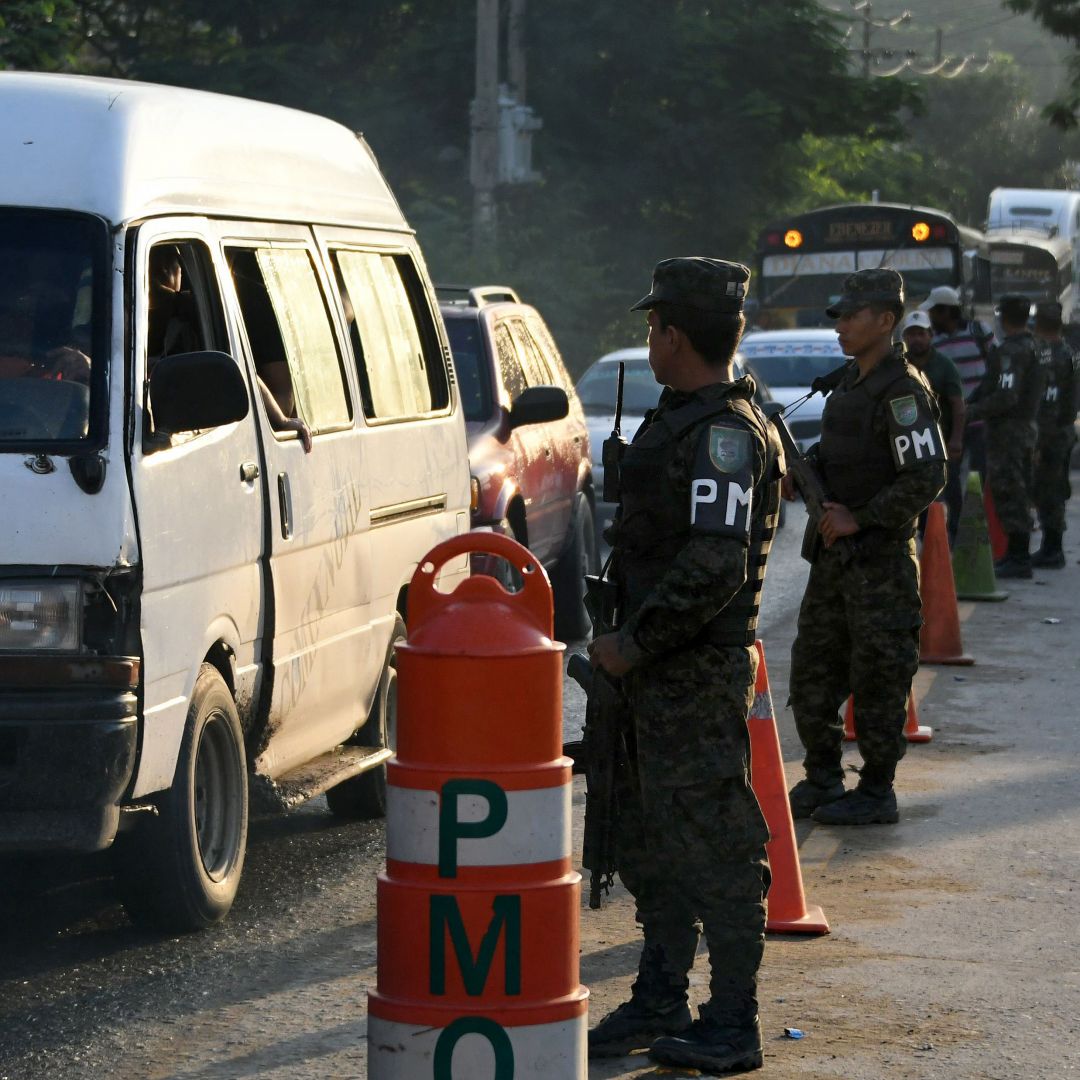 A military police checkpoint in November 2017 in San Pedro Sula, Honduras. The underlying condition that enables the extreme violence of the country's homicide highways is the region's geography.