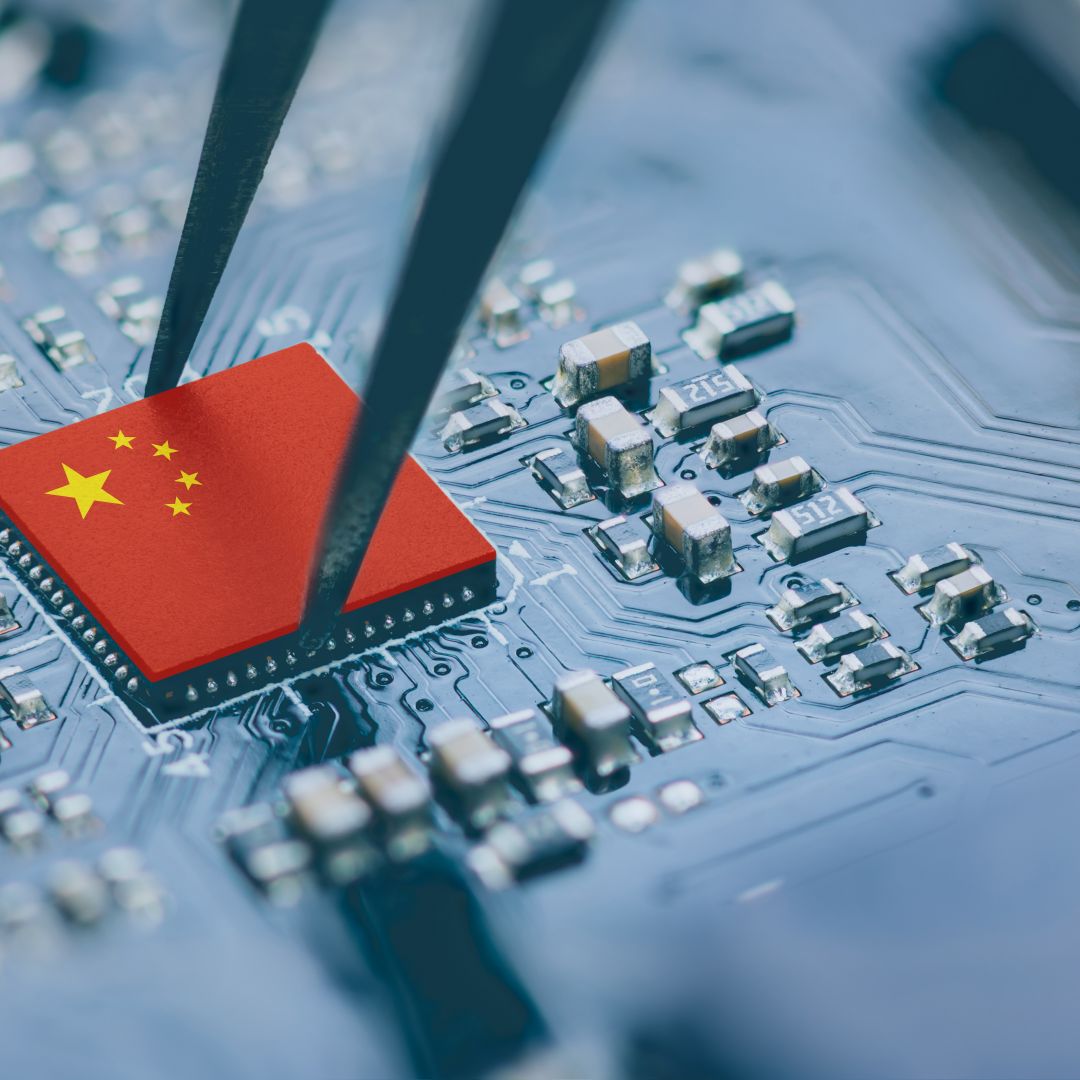 An image of a microchip painted like the Chinese flag.