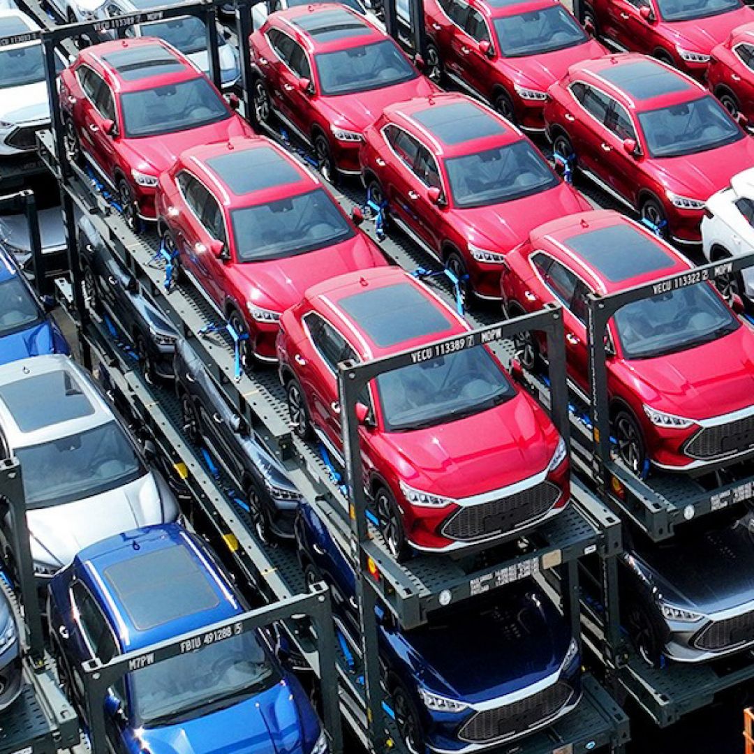 Chinese car manufacturer BYD's stacked electric vehicles wait to be loaded onto a ship at the international container terminal of Taicang Port at Suzhou Port in China's eastern Jiangsu province on Sept. 11, 2023.