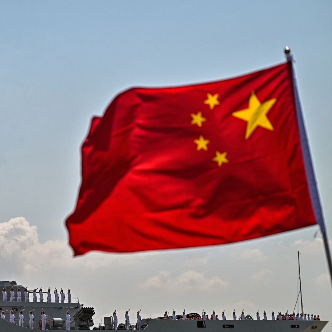 Crew members on a Chinese navy ship wave as they prepare to dock at Indonesia's Tanjung Perak Port on Aug. 2, 2026. Crew members on a Chinese navy ship wave as they prepare to dock at Indonesia's Tanjung Perak Port on Aug. 2, 2026.