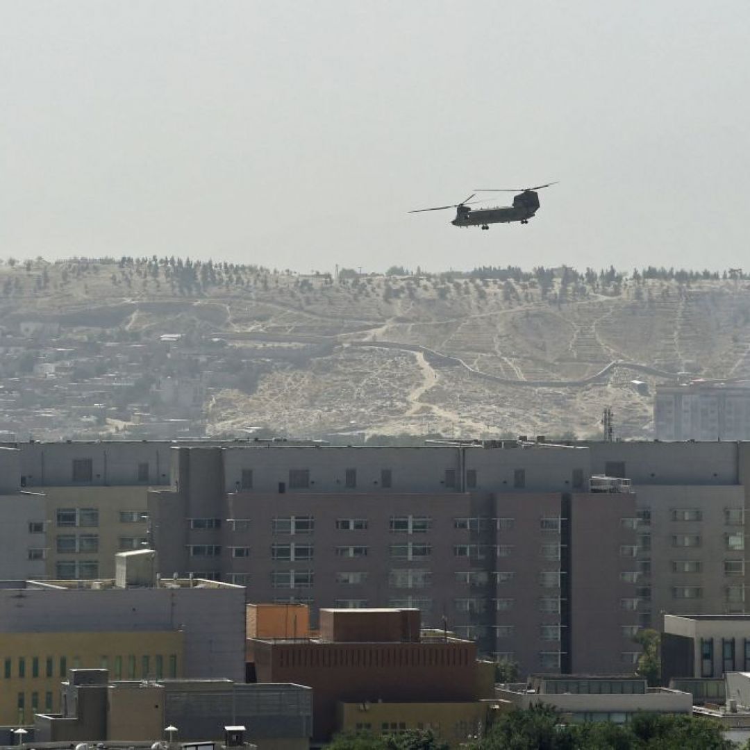A U.S. military helicopter Aug. 15, 2021, above the U.S. Embassy in Kabul, Afghanistan.