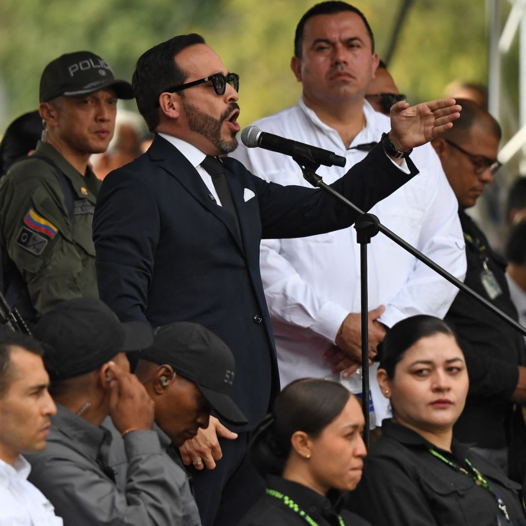 Colombia's President-elect Abelardo de la Espriella (R) delivers a speech during a military parade commemorating Colombia's Independence Day in Medellin, Colombia, on July 20, 2026. 