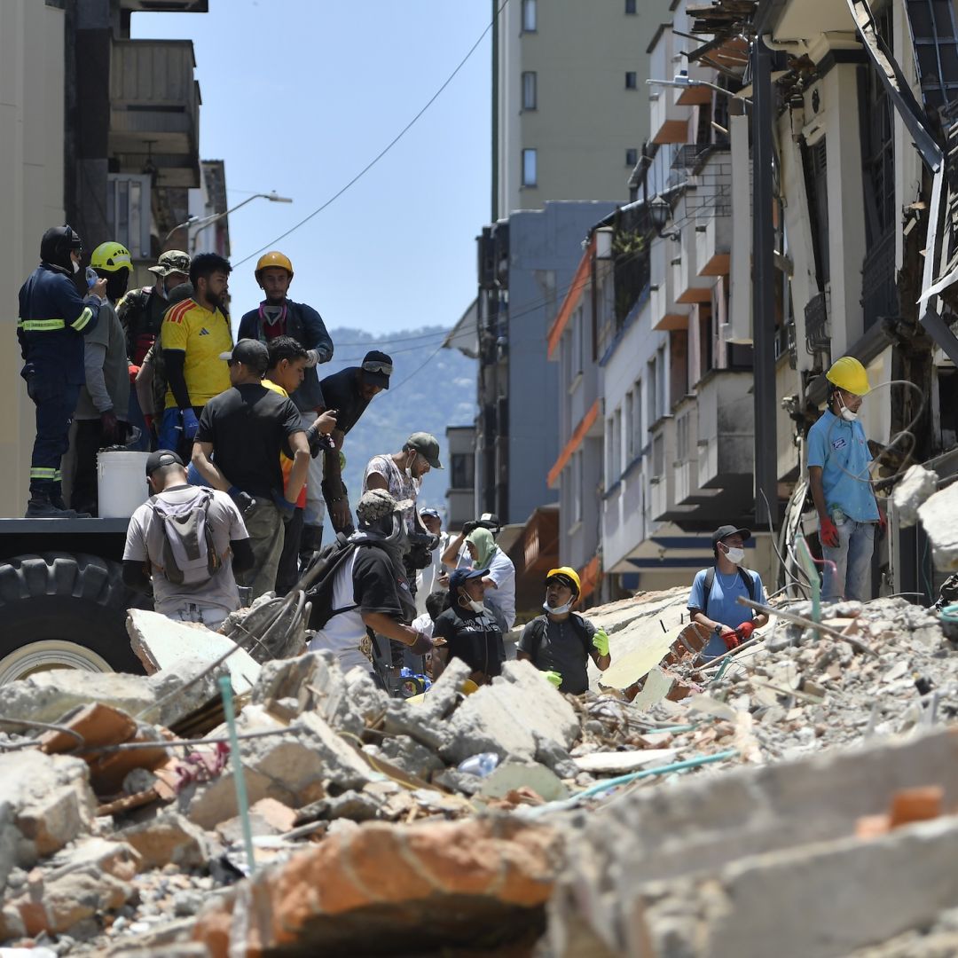 Rescuers and volunteers search for survivors under a collapsed building in Pereira, Colombia, on Aug. 11, 2026, following a magnitude 7.4 earthquake. Rescuers and volunteers search for survivors under a collapsed building in Pereira, Colombia, on Aug. 11, 2026, following a magnitude 7.4 earthquake.