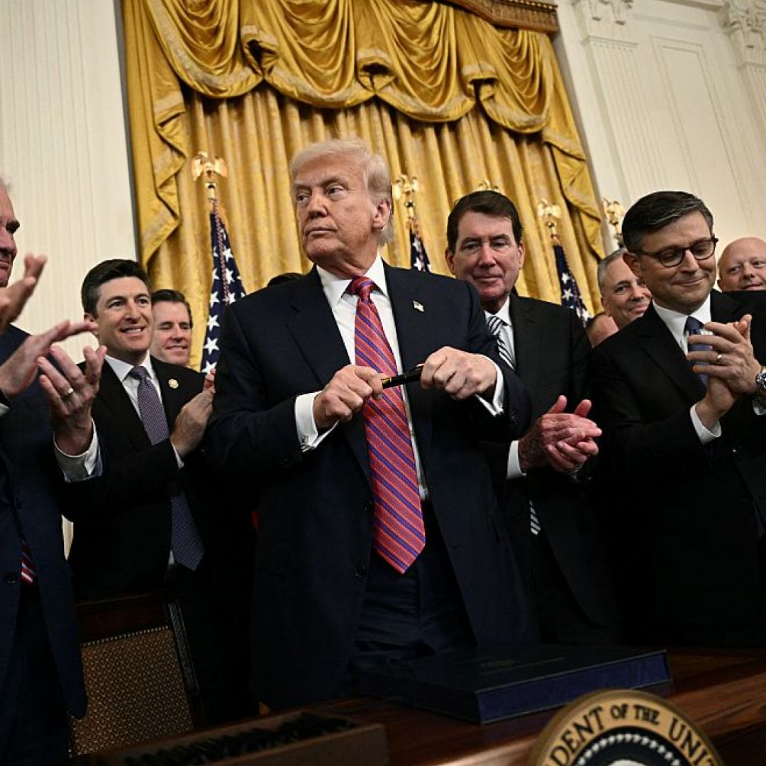 U.S. President Donald Trump prepares to sign the GENIUS Act in the East Room of the White House in Washington, DC, on July 18, 2025. U.S. President Donald Trump prepares to sign the GENIUS Act in the East Room of the White House in Washington, DC, on July 18, 2025.