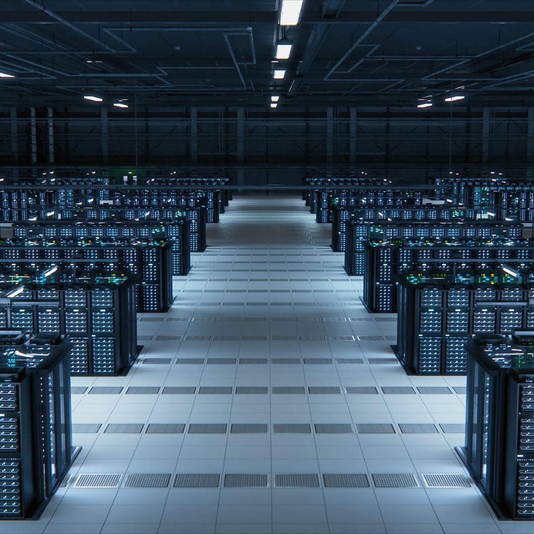 A stock photo shows the inside of a modern data center.
