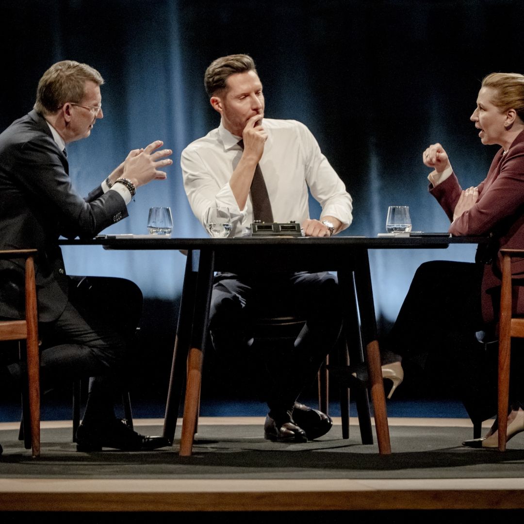 Danish Defense Minister and top candidate of Denmark's Venstre party, Troels Lund Poulsen (left), and Danish Prime Minister and top candidate of the Social Democrat Party, Mette Frederiksen (right), attend a debate in Copenhagen on March 15, 2026.