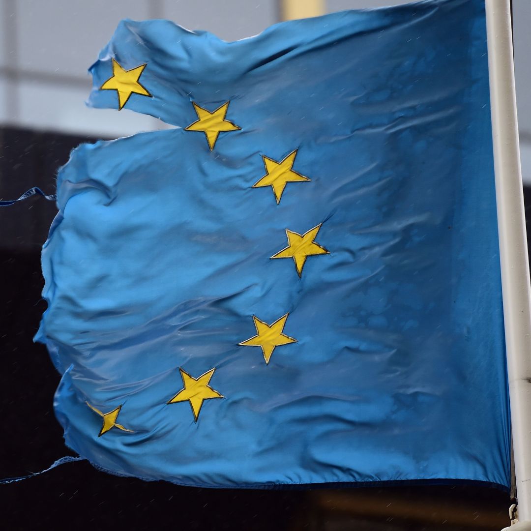 A shredded EU flag flutters in the wind on March 1, 2016, in Brussels, Belgium. 