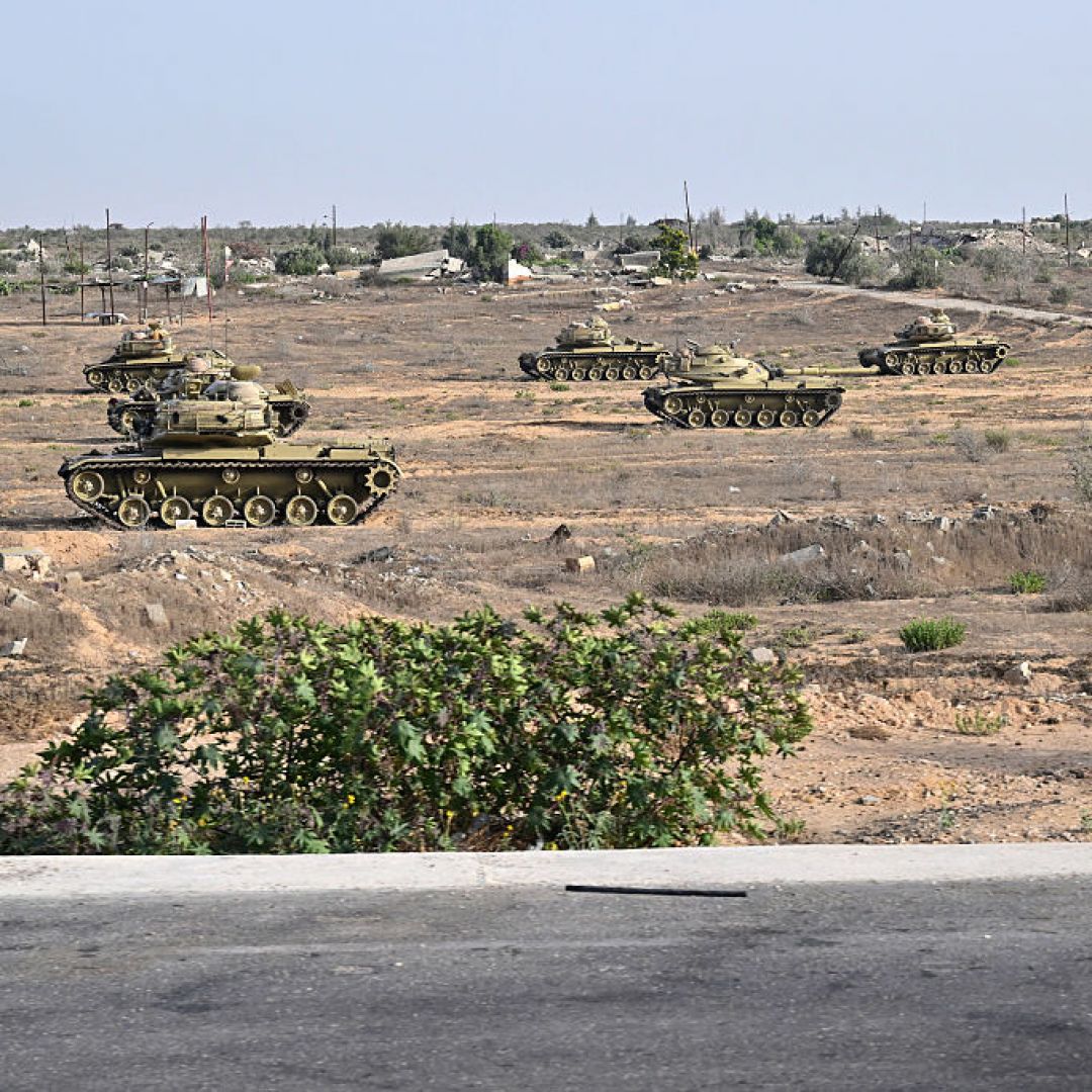 Egyptian army vehicles are deployed along the border with the Gaza Strip on July 4, 2024, in the north Sinai Peninsula. 