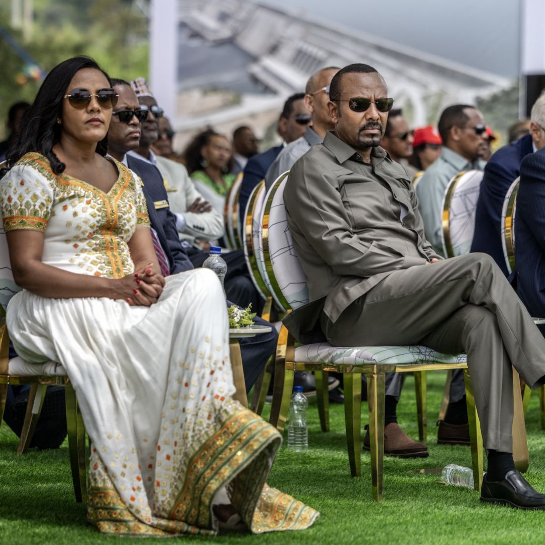 Ethiopian Prime Minister Abiy Ahmed (center), flanked by his wife (left) and Djibouti's President Ismail Omar Guelleh (right), attends the official inauguration ceremony of the Grand Ethiopian Renaissance Dam (GERD) in Guba, on Sept. 9, 2025. Ethiopian Prime Minister Abiy Ahmed (center), flanked by his wife (left) and Djibouti's President Ismail Omar Guelleh (right), attends the official inauguration ceremony of the Grand Ethiopian Renaissance Dam (GERD) in Guba, on Sept. 9, 2025.