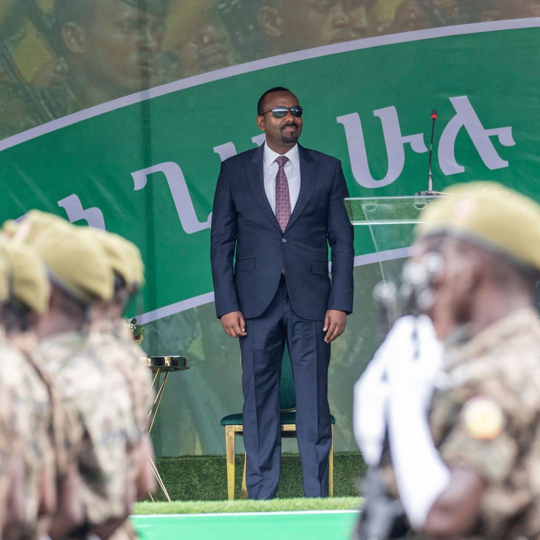 Ethiopian Prime Minister Abiy Ahmed (C) on Oct. 26, 2023, looks on as members of the Ethiopian National Defense Force parade on Ethiopian Defense Force Day in Addis Ababa, Ethiopia. The latest confrontation between the Ethiopian military and the Tigray Peoples' Liberation Front could signal more frequent clashes between the two sides that risk merging northern Ethiopia's conflicts with Sudan's civil war and could trigger a severe military escalation. Ethiopian Prime Minister Abiy Ahmed (C) on Oct. 26, 2023, looks on as members of the Ethiopian National Defense Force parade on Ethiopian Defense Force Day in Addis Ababa, Ethiopia.