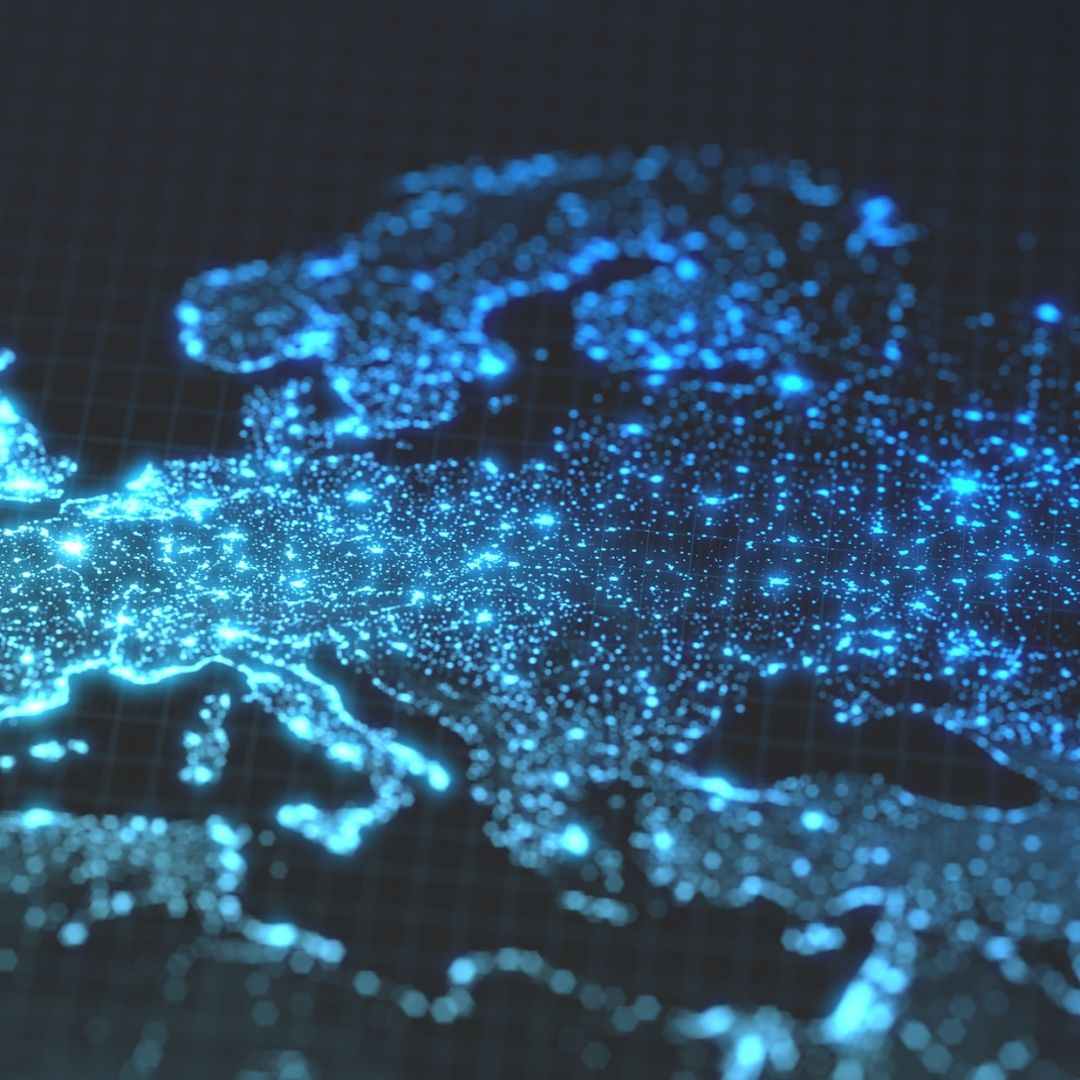 A map of Europe with glowing details of city and human population density areas. 