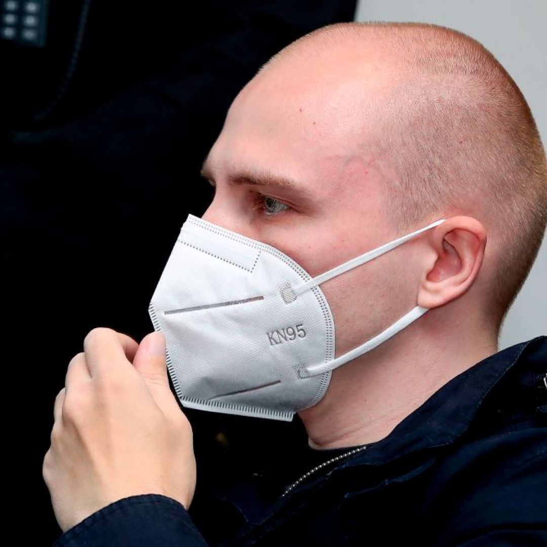 Stephan Balliet, who is accused of shooting two people dead after an attempt to storm a synagogue in Halle an der Saale, eastern Germany, wears a face mask as he waits for the start of the 18th day of his trial on Nov. 3, 2020, at the district court in Magdeburg, eastern Germany.