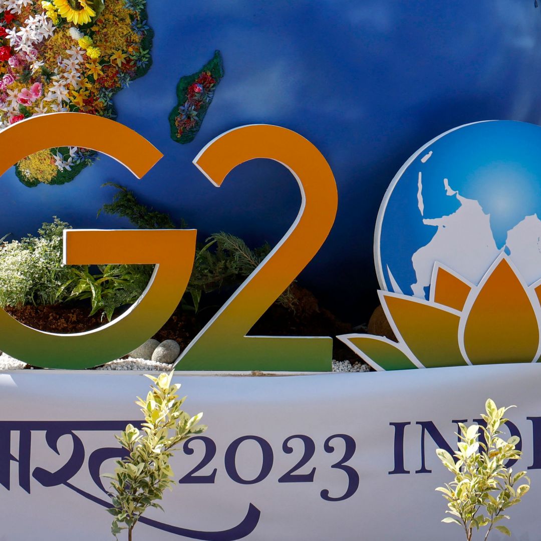 A worker decorates a G20 installation on the eve of the two-day G20 summit in New Delhi on September 8, 2023.