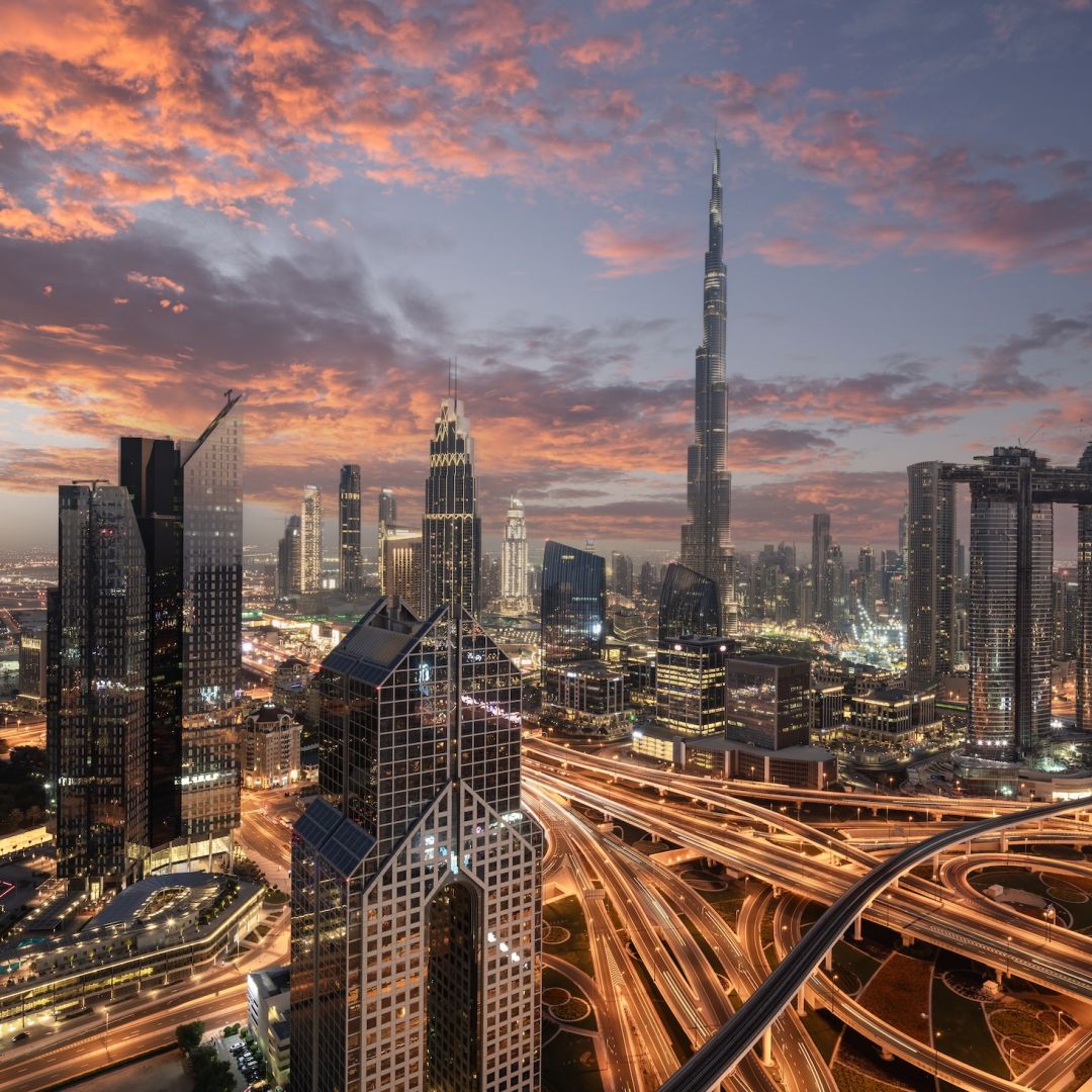 The city skyline in Dubai is seen at sunset.