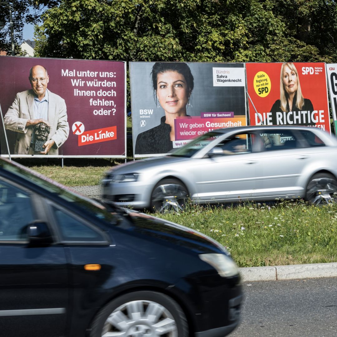 Cars drive past election campaign posters in the German city of Zwickau, located in the eastern state of Saxony, on Aug. 20, 2024, ahead of Saxony's Sept. 1 state election. 