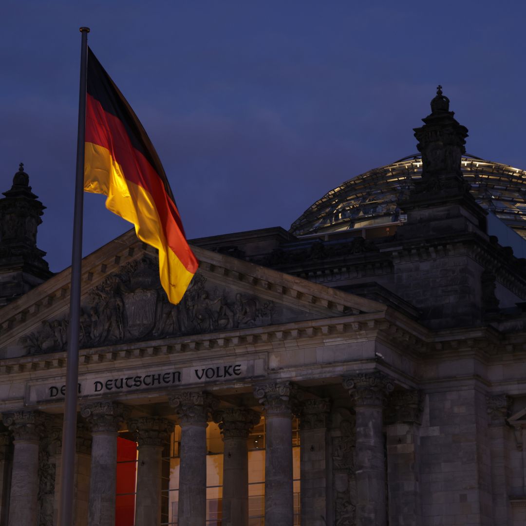 The seat of Germany's lower house of parliament stands at dusk on the day police conducted nationwide raids against a suspected insurrectionist group on Dec. 7, 2022, in Berlin, Germany. 