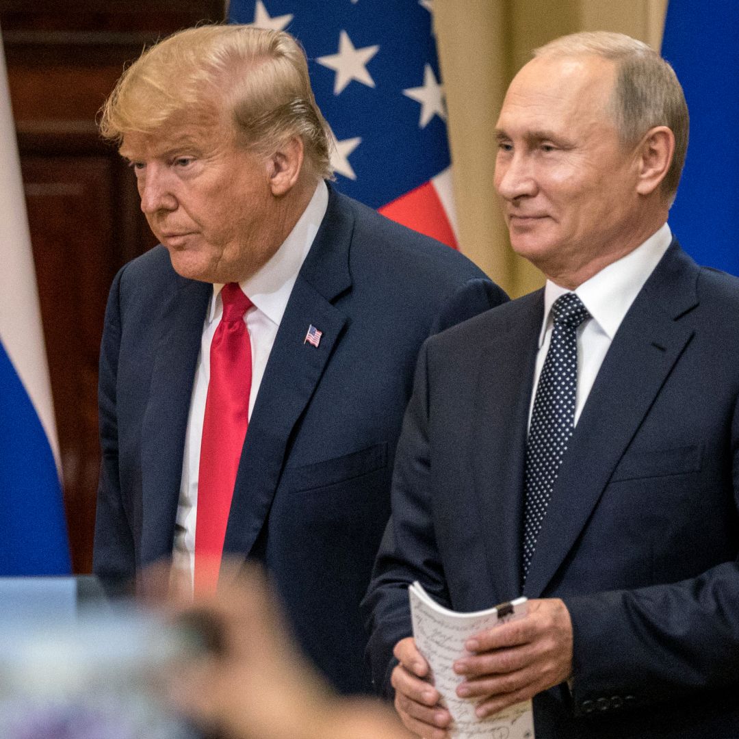 U.S. President Donald Trump (left) and Russian President Vladimir Putin arrive at a press conference after their summit on July 16, 2018, in Helsinki, Finland.