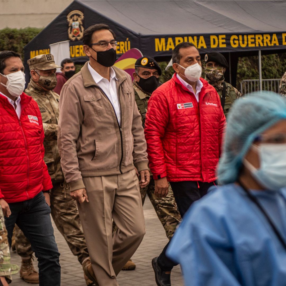 Peruvian President Martin Vizcarra (center) arrives to oversee the distribution of essential products among those in need amid the country’s COVID-19 crisis in Villa Maria del Triunfo, Peru, on Sept. 15, 2020. Peruvian President Martin Vizcarra (center) arrives to oversee the distribution of essential products among those in need amid the country’s COVID-19 crisis in Villa Maria del Triunfo, Peru, on Sept. 15, 2020.