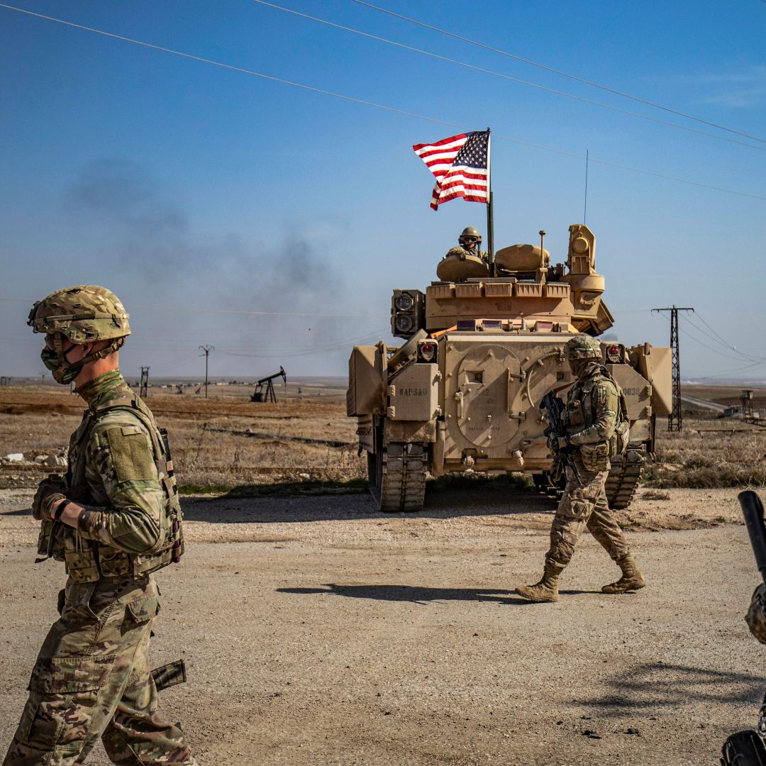 U.S. soldiers patrol oil fields in northeast Syria on Feb. 13, 2021.