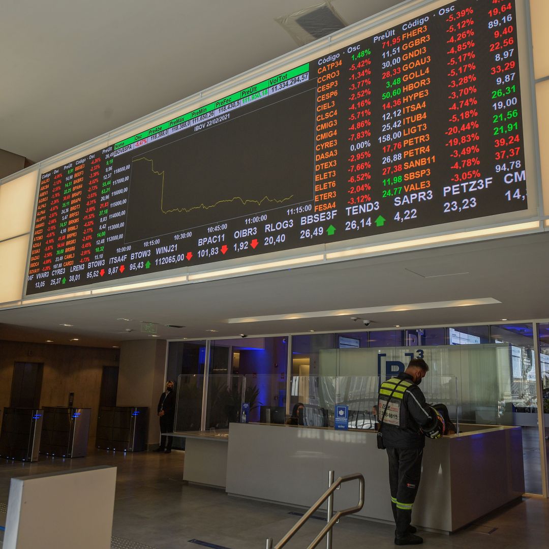 An electronic board shows the index chart at the Sao Paulo Stock Exchange after shares in Brazilian state oil giant Petrobras plunged amid news of a leadership shake-up on Feb. 22, 2021. 