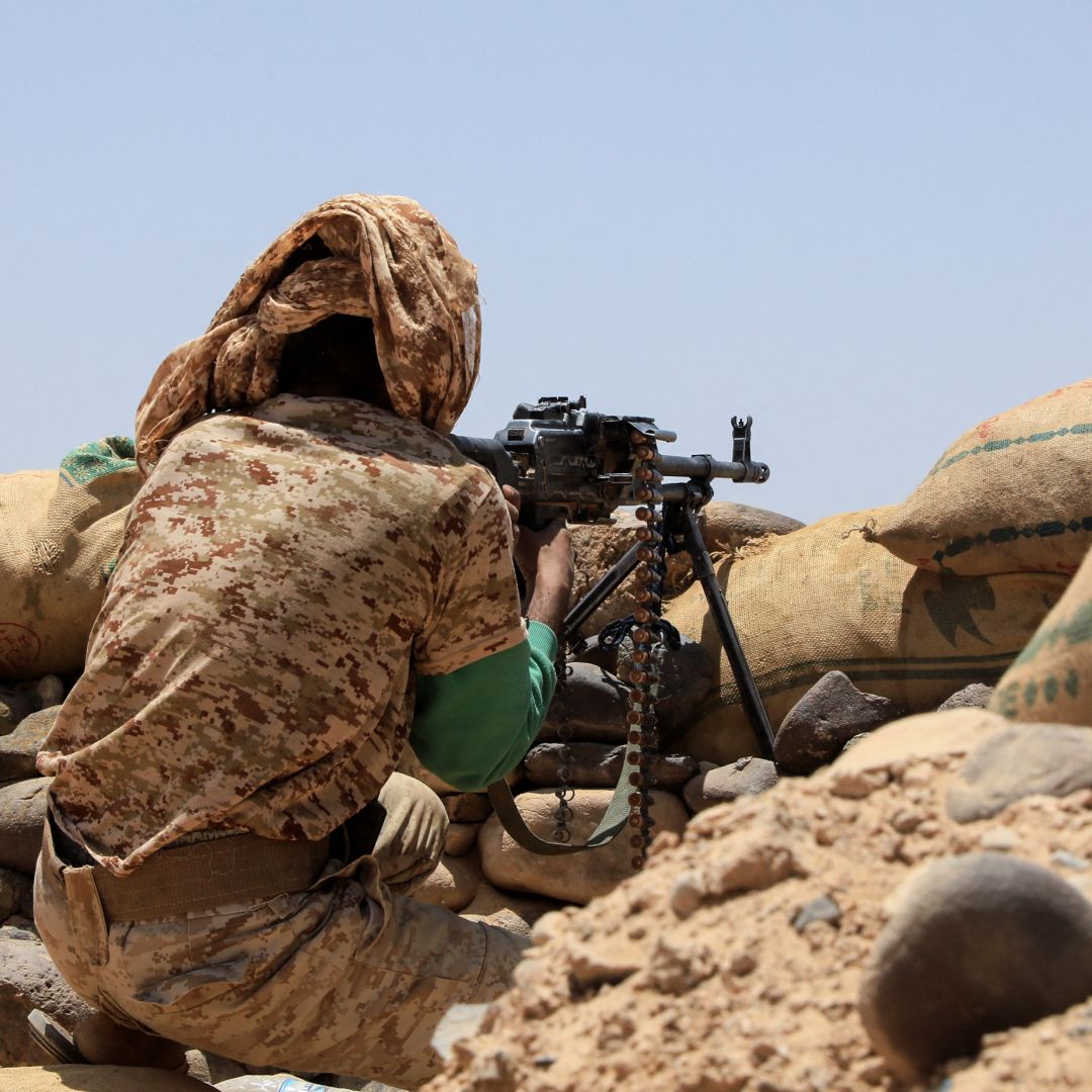 A fighter with forces loyal to Yemen's Saudi-backed government holds a position against Iran-backed Houthi rebels in the northeastern province of Marib on April 6, 2021. 