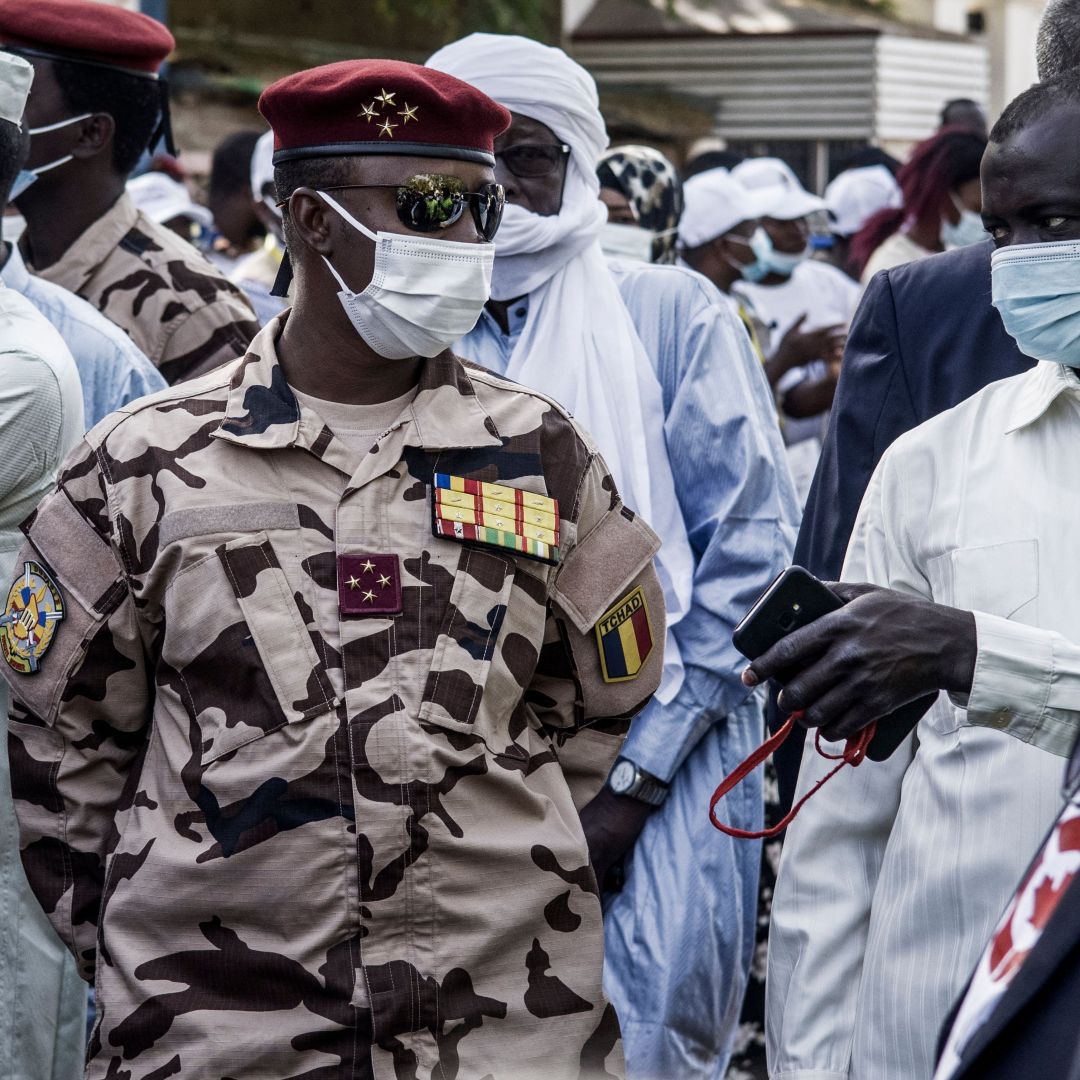 Four Star General Mahamat Idriss Deby Itno (center), son of late Chadian President Idriss Deby Itno, is seen at a polling station in N'djamena on April 11, 2021. 