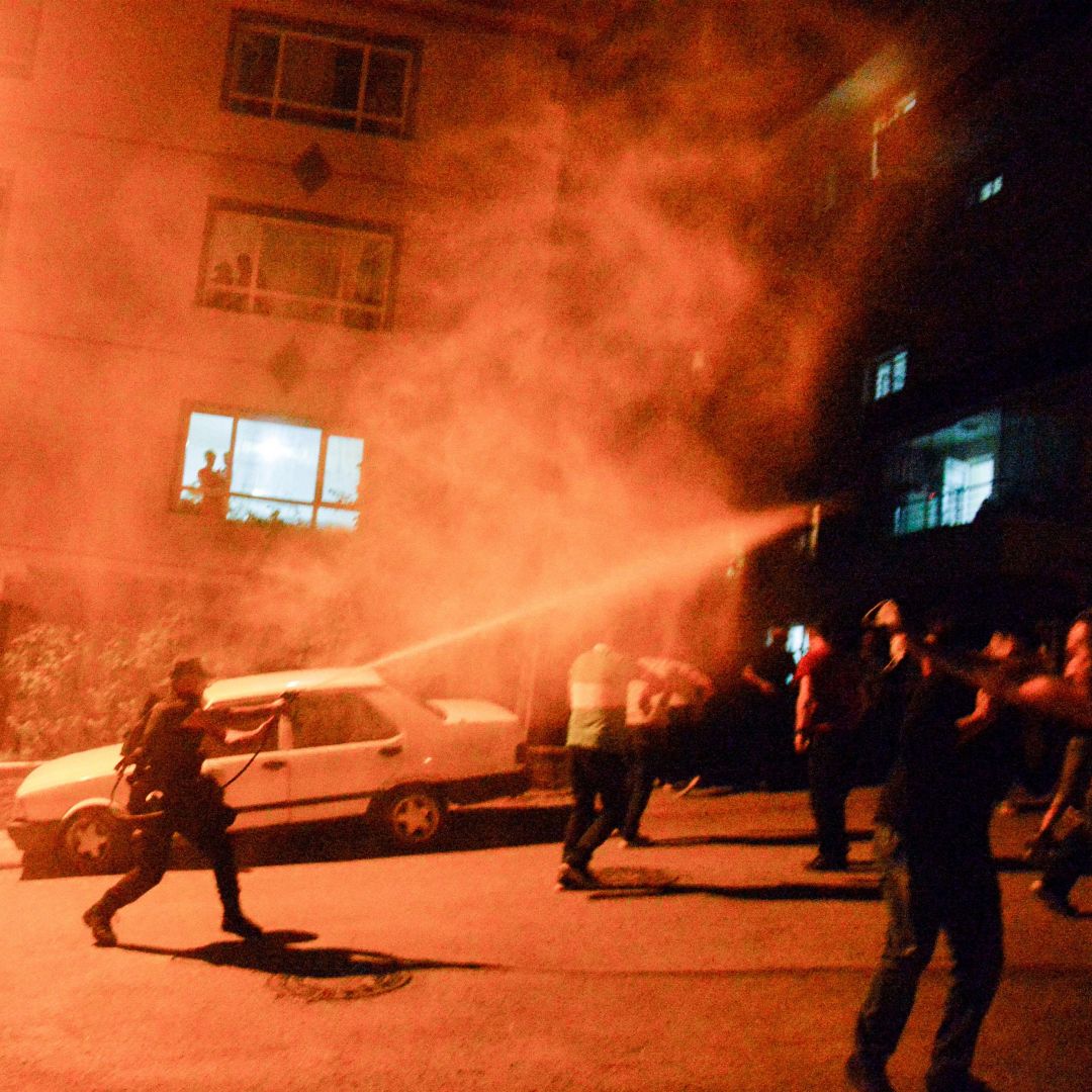 Police use tear gas to disperse clashes between locals and migrants in Ankara, Turkey, on Aug. 12, 2021. Police use tear gas to disperse clashes between locals and migrants in Ankara, Turkey, on Aug. 12, 2021.