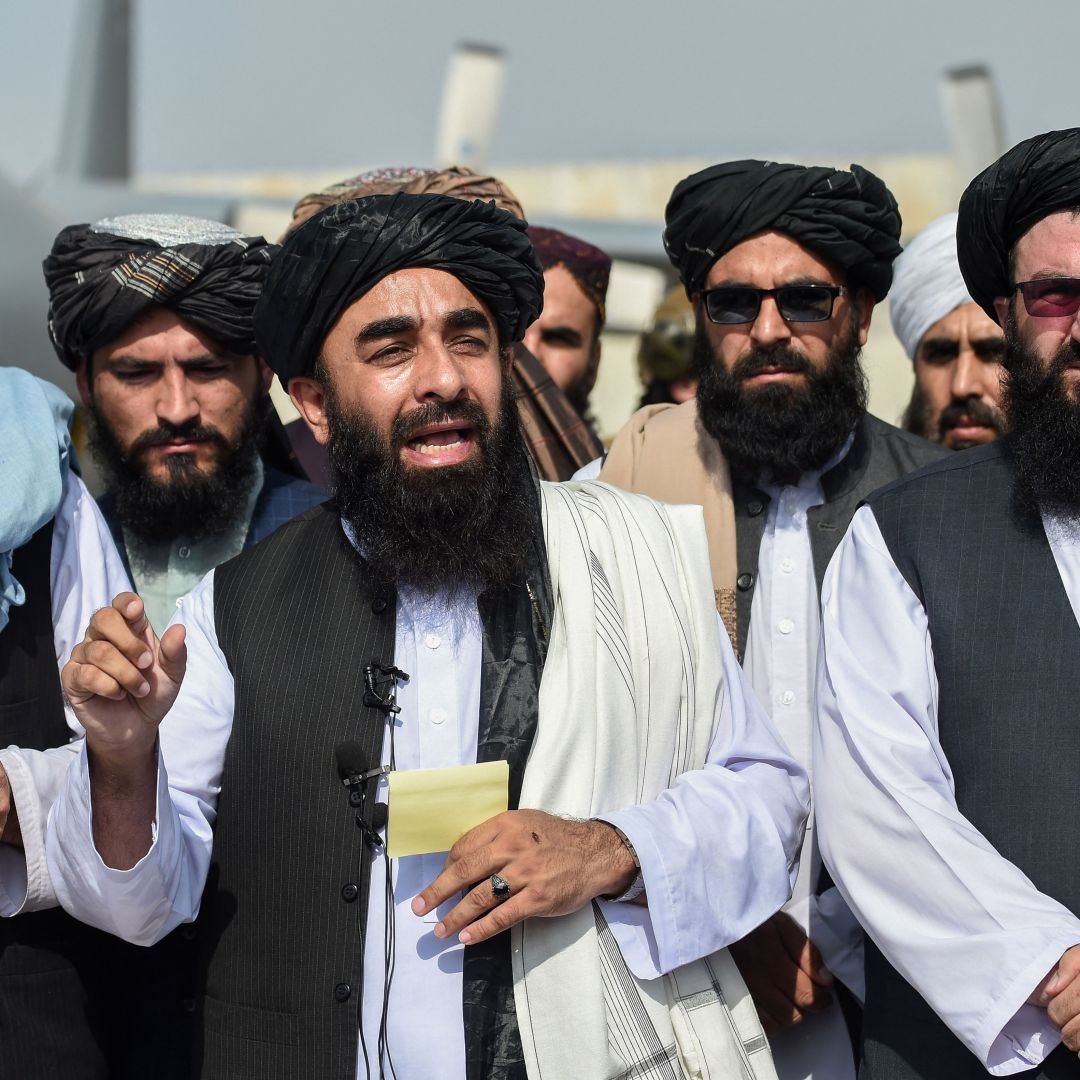 Taliban spokesman Zabihullah Mujahid addresses media at the Kabul airport on Aug. 31, 2021. 