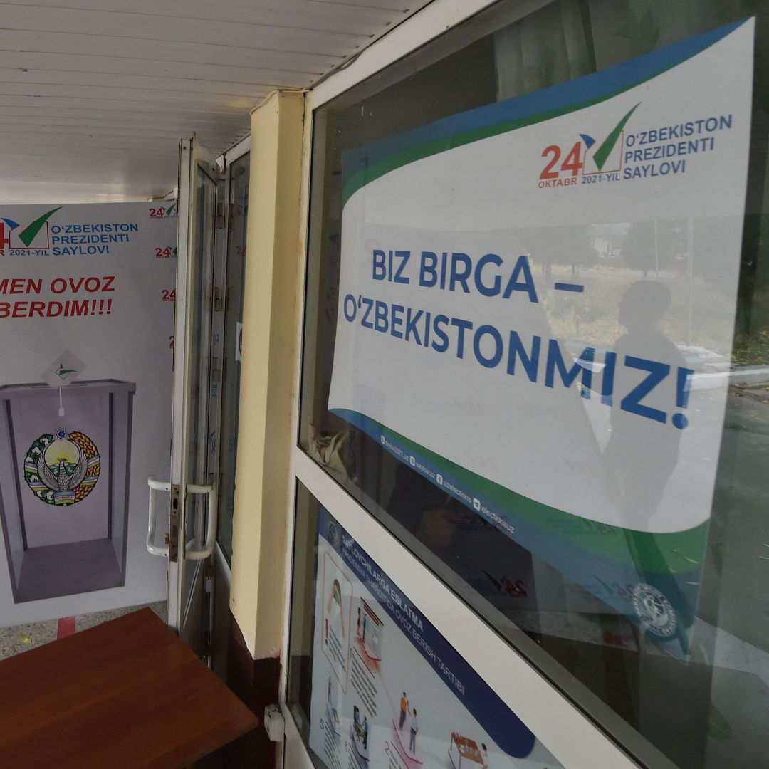 Members of a local election commission prepare a polling station in Tashkent, Uzbekistan, on Oct. 21, 2021, ahead of the country’s presidential election. 