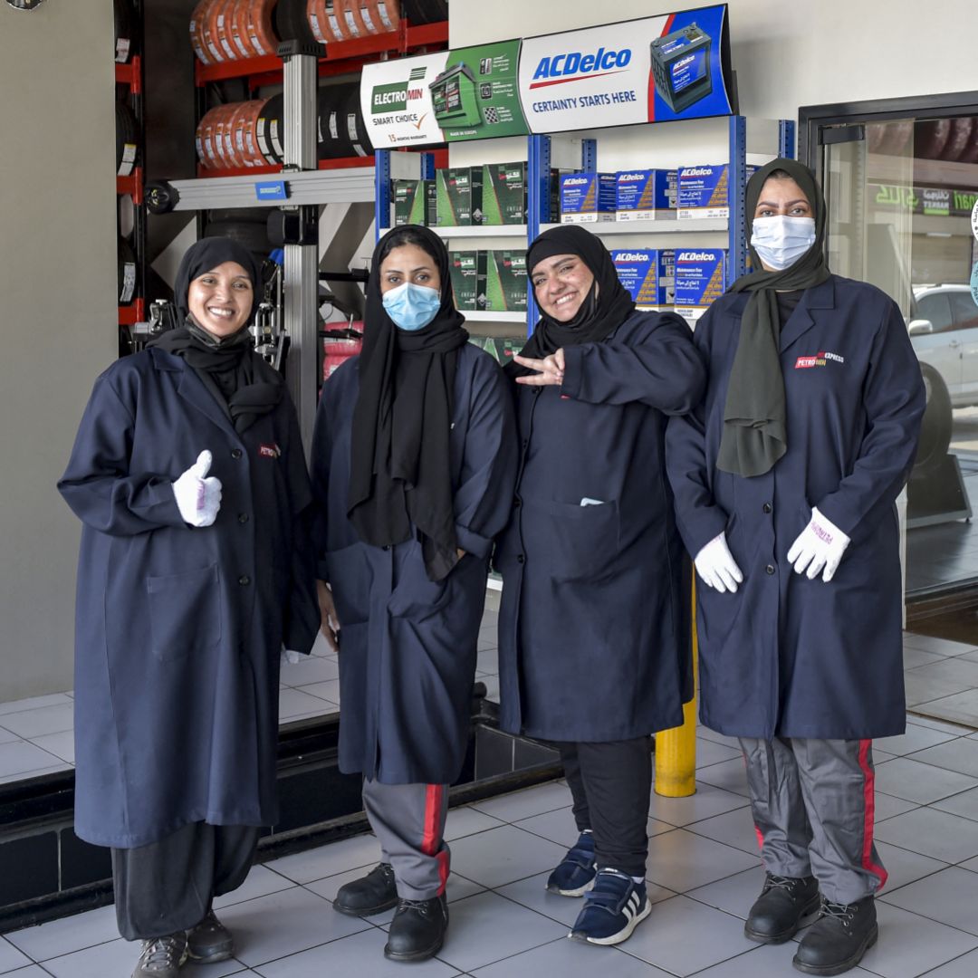 Women mechanics pose for a photo at a car repair and service shop in Jeddah, Saudi Arabia, on Dec. 27, 2021. Women mechanics pose for a photo at a car repair and service shop in Jeddah, Saudi Arabia, on Dec. 27, 2021.