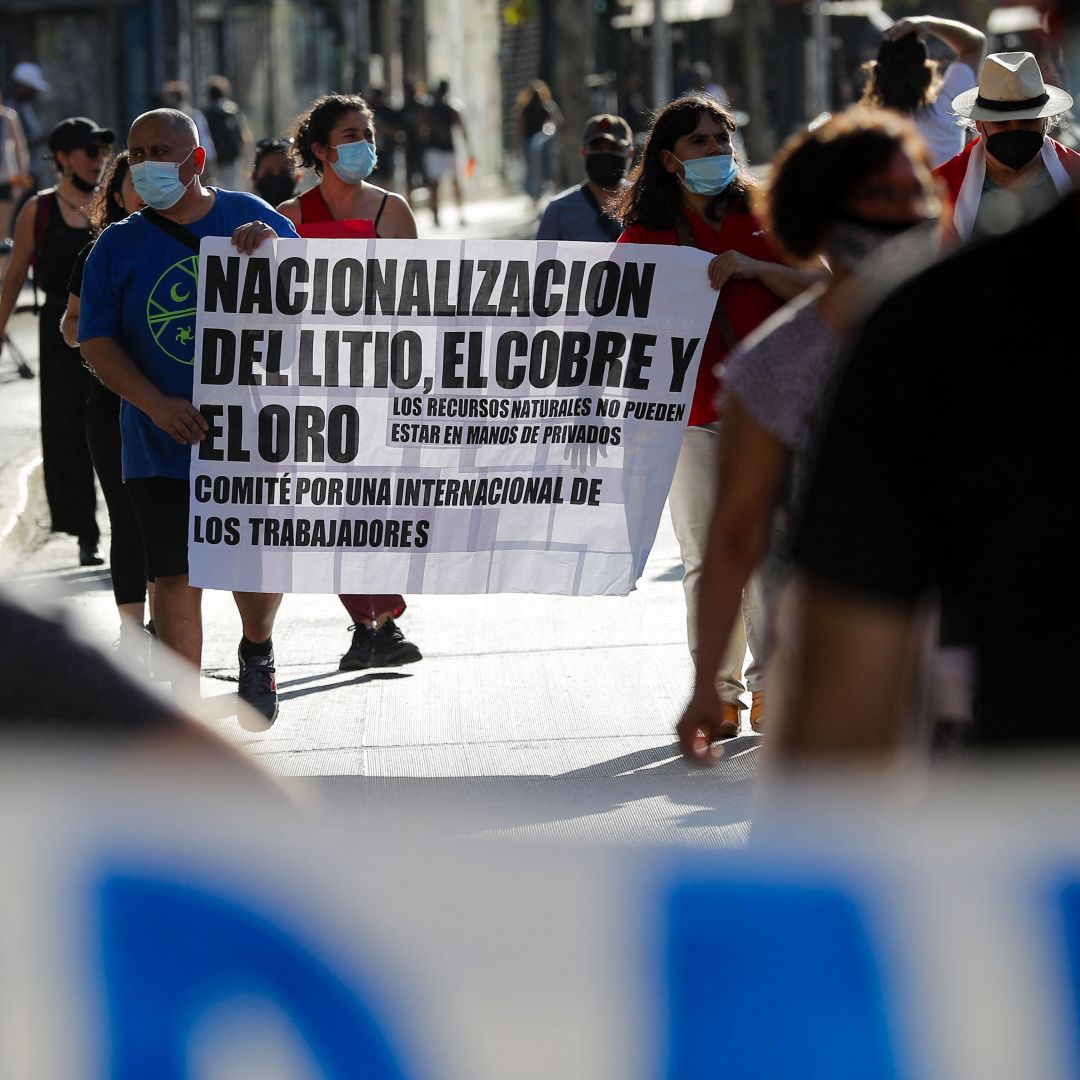 Demonstrators in Santiago take part in a protest against Chilean President Sebastian Pinera’s efforts to privatize the country’s lithium industry on Jan. 7, 2022. 