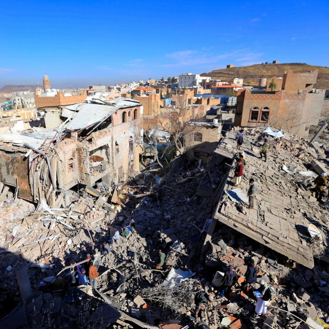 Damaged buildings in the rebel-held capital of Sanaa are seen on Jan. 18, 2022, after the Saudi-led coalition in Yemen launched airstrikes in retaliation for a deadly Houthi attack on Abu Dhabi. 