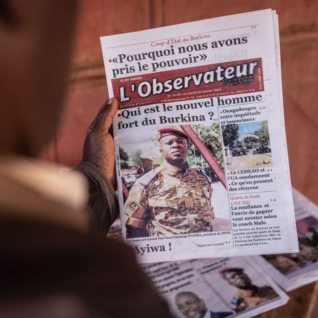 A photo of Lt. Col. Paul Henri Sandaogo Damiba, leader of Burkina Faso’s recent military coup, is seen on the front page of a newspaper in Ouagadougou on Jan. 25, 2022. A photo of Lt. Col. Paul Henri Sandaogo Damiba, leader of Burkina Faso’s recent military coup, is seen on the front page of a newspaper in Ouagadougou on Jan. 25, 2022.