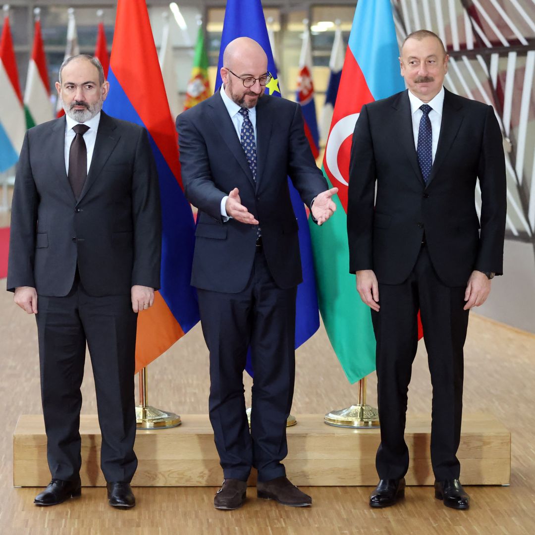 Armenian Prime Minister Nikol Pashinyan (left), European Council President Charles Michel (center) and Azerbaijani President Ilham Aliyev (right) pose for a photo in Brussels on April 6, 2022, before participating in EU-mediated talks on the Nagorno-Karabakh dispute. 