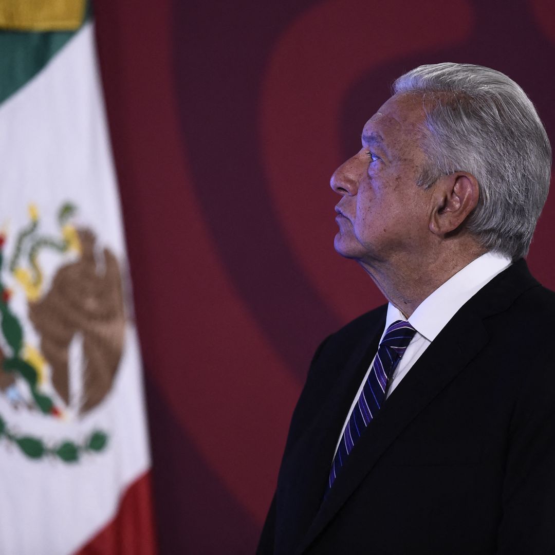 Mexican President Andres Manuel Lopez Obrador looks at a graph during his daily press conference in Mexico City on April 11, 2022. 