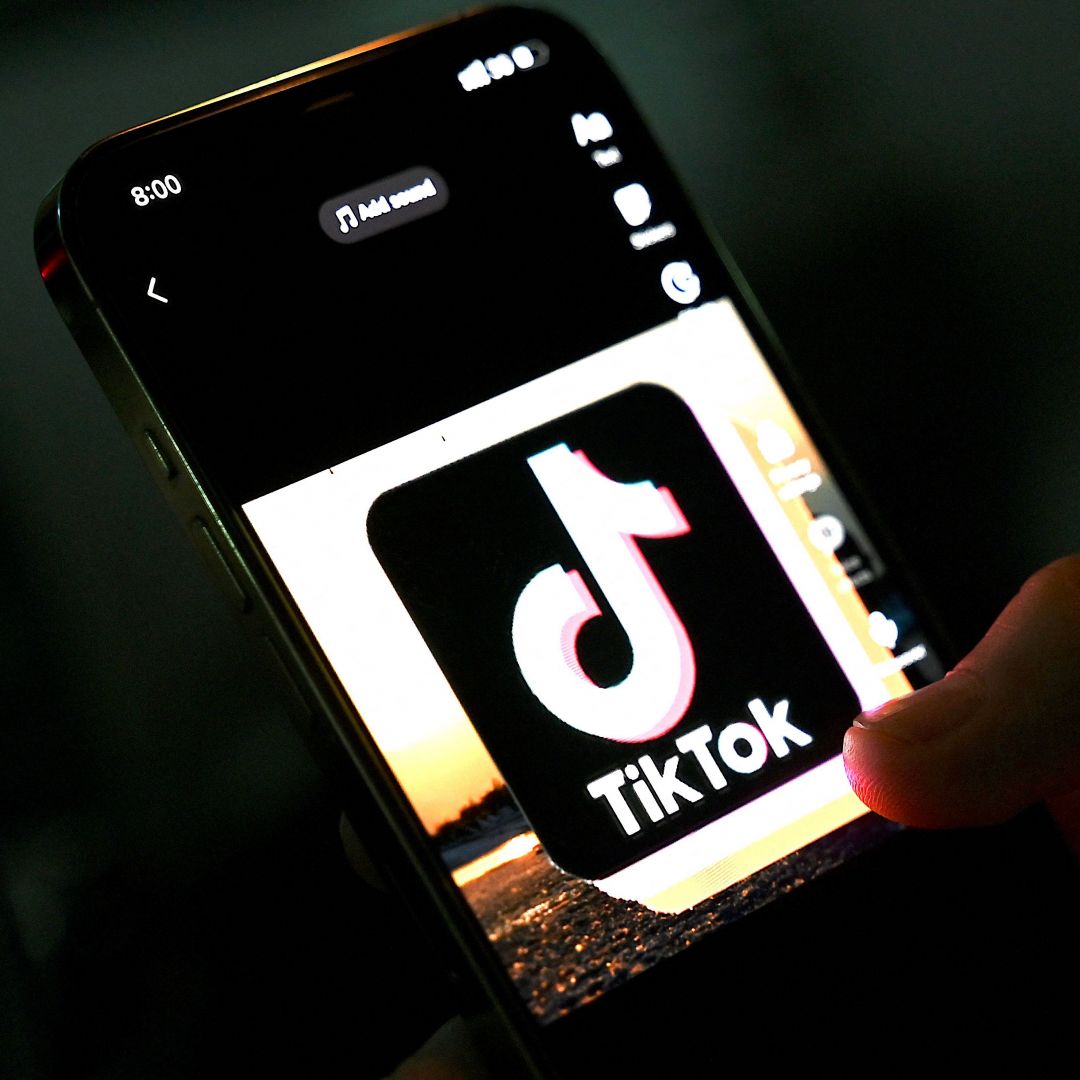 In this photo illustration taken on April 21, 2022, the icon of the video-sharing app TikTok is pictured on a mobile phone. In this photo illustration taken on April 21, 2022, the icon of the video-sharing app TikTok is pictured on a mobile phone.