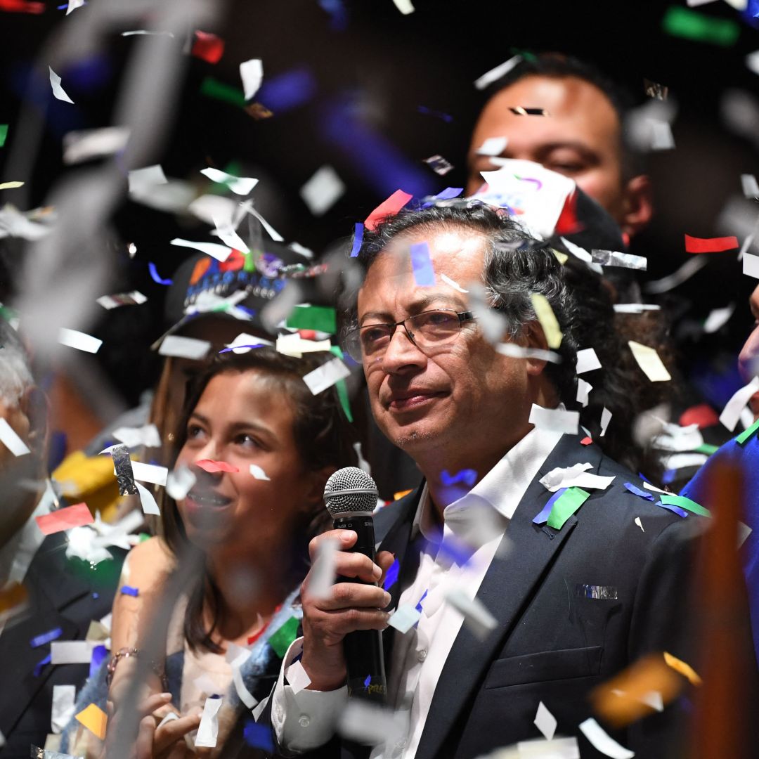 Gustavo Petro (center) celebrates with supporters in Bogota after winning Colombia’s presidential election on June 19, 2022. Gustavo Petro (center) celebrates with supporters in Bogota after winning Colombia’s presidential election on June 19, 2022.