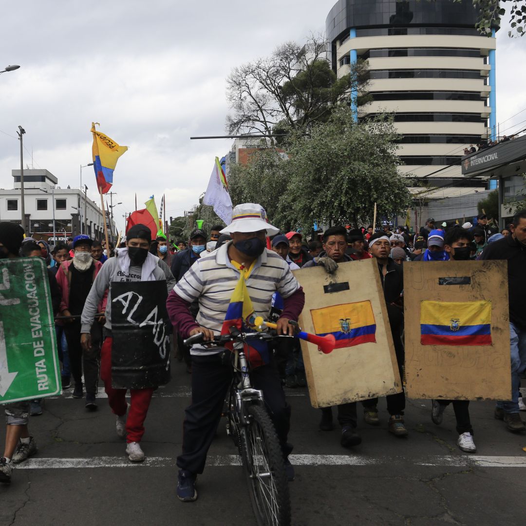 Demonstrators carry makeshift shields during the tenth day of protests against the administration of Ecuadorian President Guillermo Lasso on June 22, 2022, in Quito, Ecuador. Demonstrators carry makeshift shields during the tenth day of protests against the administration of Ecuadorian President Guillermo Lasso on June 22, 2022, in Quito, Ecuador.