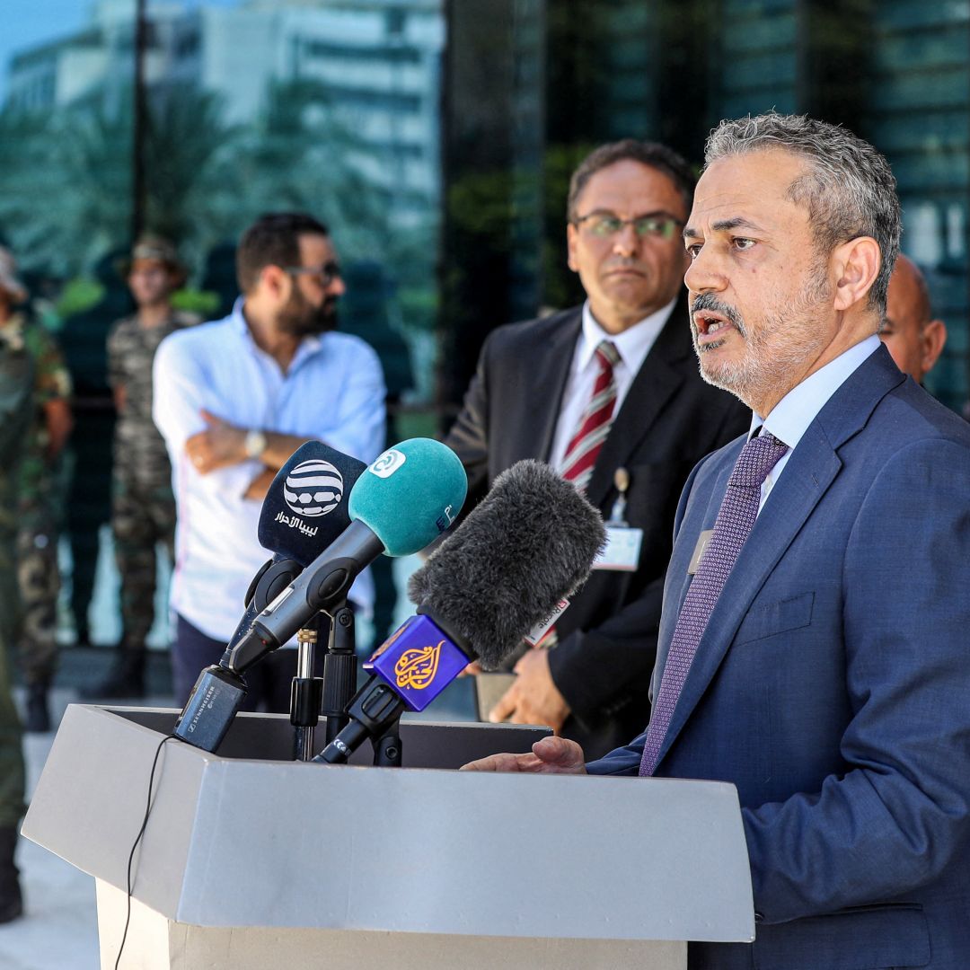 Farhat Bengdara, the new chief of Libya's National Oil Corporation appointed by Prime Minister Abdulhamid Dbeibah, gives a press conference outside the company’s headquarters in Tripoli on July 14, 2022.