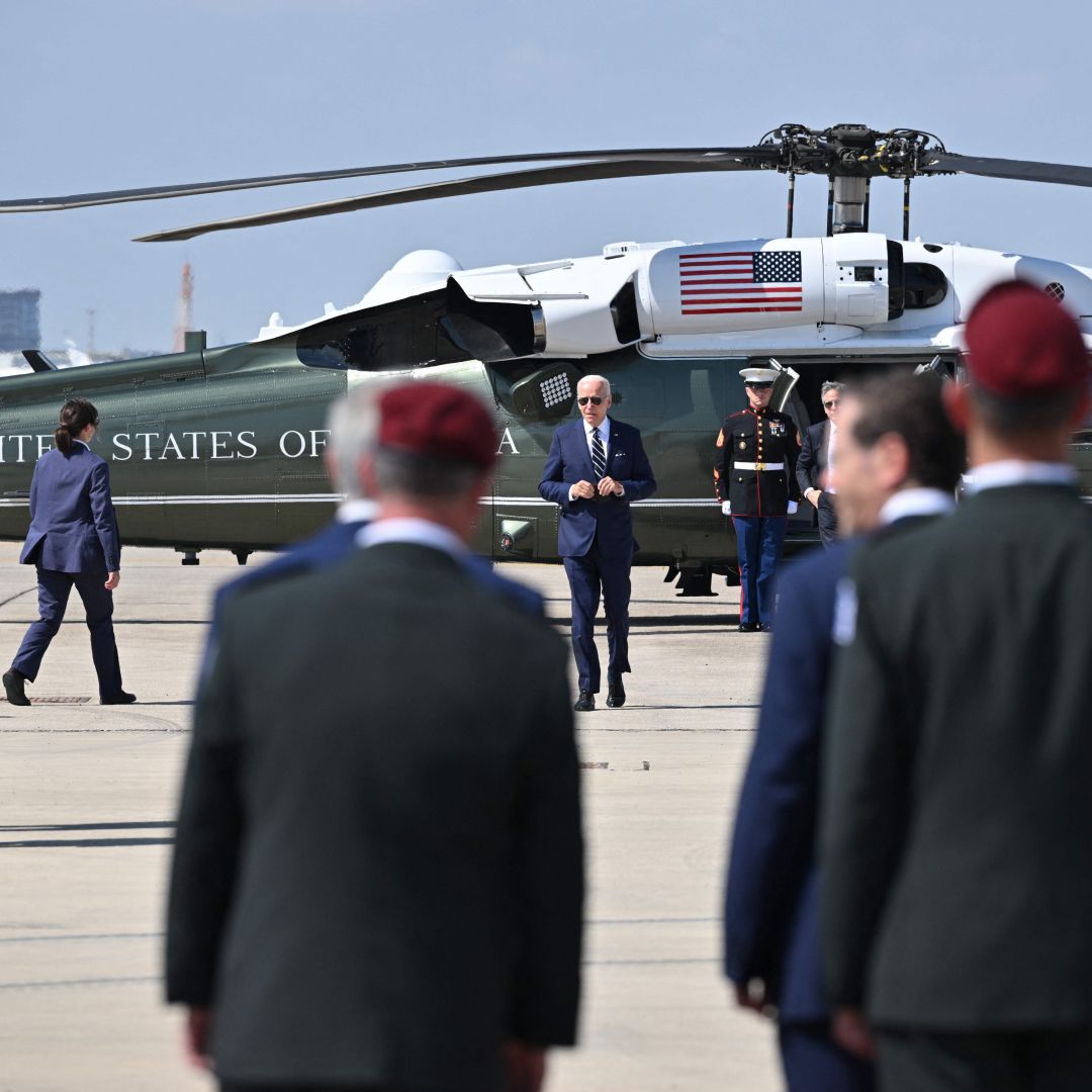 U.S. President Joe Biden makes his way to board Air Force One at Israel's Ben Gurion Airport on July 15, 2022, as he departs for Saudi Arabia after a two-day visit to Israel. 