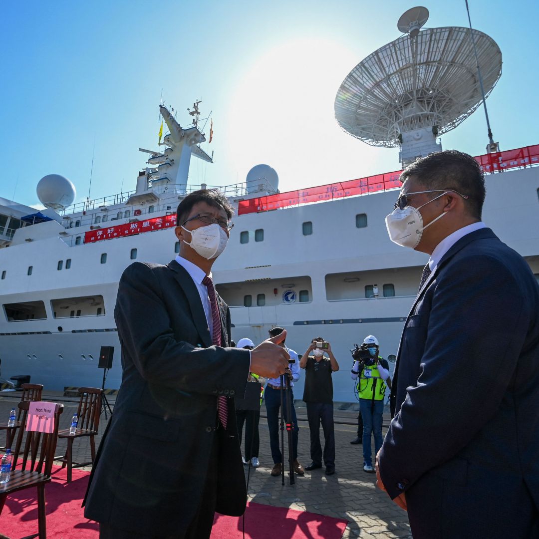 China's ambassador to Sri Lanka (left) gestures upon the arrival of China's research and survey vessel, the Yuan Wang 5, at the Hambantota port on Aug. 16, 2022. China's ambassador to Sri Lanka (left) gestures upon the arrival of China's research and survey vessel, the Yuan Wang 5, at the Hambantota port on Aug. 16, 2022.