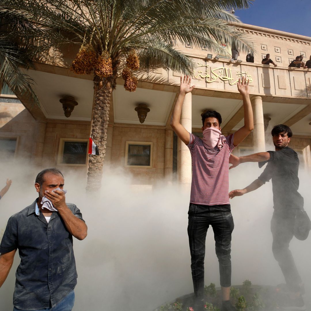 Supporters of Shiite cleric Muqtada al-Sadr gather outside the headquarters of the Iraqi government in Baghdad's Green Zone on Aug. 29, 2022. 