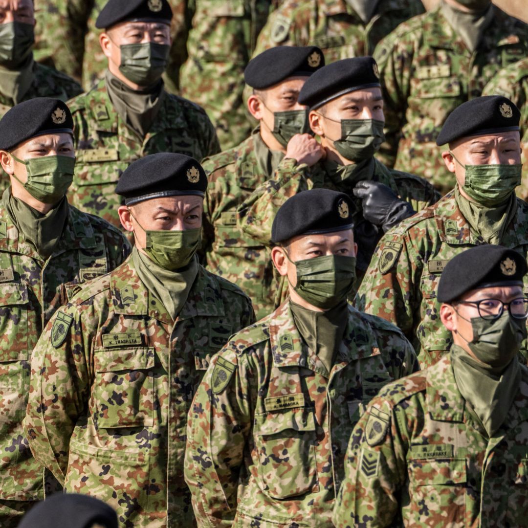 Members of Japan's Self-Defense Force stand in formation during the defense minister's speech following a joint military exercise with U.S., U.K. and Australian troops in Funabashi, Japan, on Jan. 8, 2023. 
